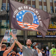 Conspiracy theorist QAnon demonstrators protest child trafficking, an issue the group has co-opted to recruit new members through hashtags like #savethechildren, on Hollywood Boulevard in Los Angeles, California, August 22, 2020.